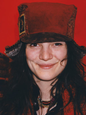 Close up of a woman wearing a Teddy Hat
