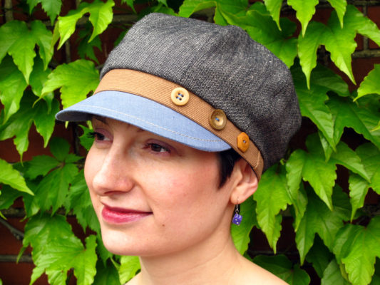 woman wearing a linen Carnaby Cap