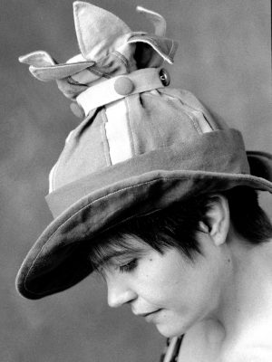An early black and white photo of Gwendolyne Preboy modelling her linen one off Petal Rim Hat.