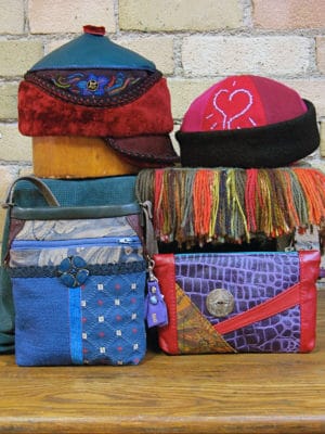 A group of 2 hat and 2 bag designs