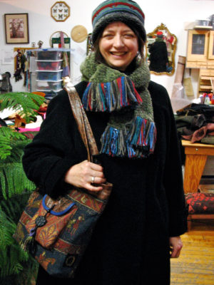 Happy new customer wearing her new Tibetan hat and Marco Polo Tote bag.