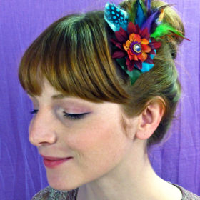 woman wearing flower fascinator in her hair