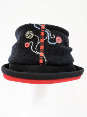 A black and red Harvest Moon Hat with a white background