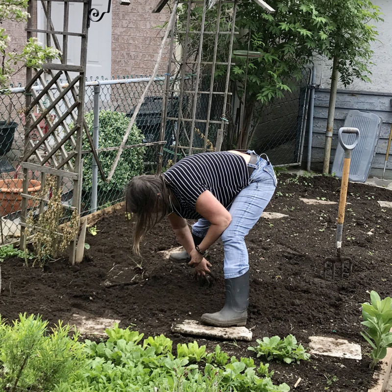 Yvetta planting her seedlings